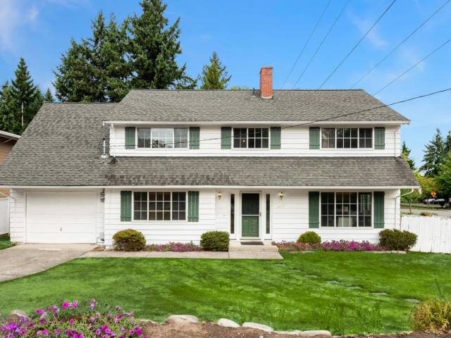 Traditional NW 2 story home with so much potential.