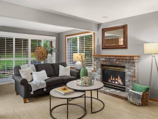 A cozy gas fireplace warms up the main floor.